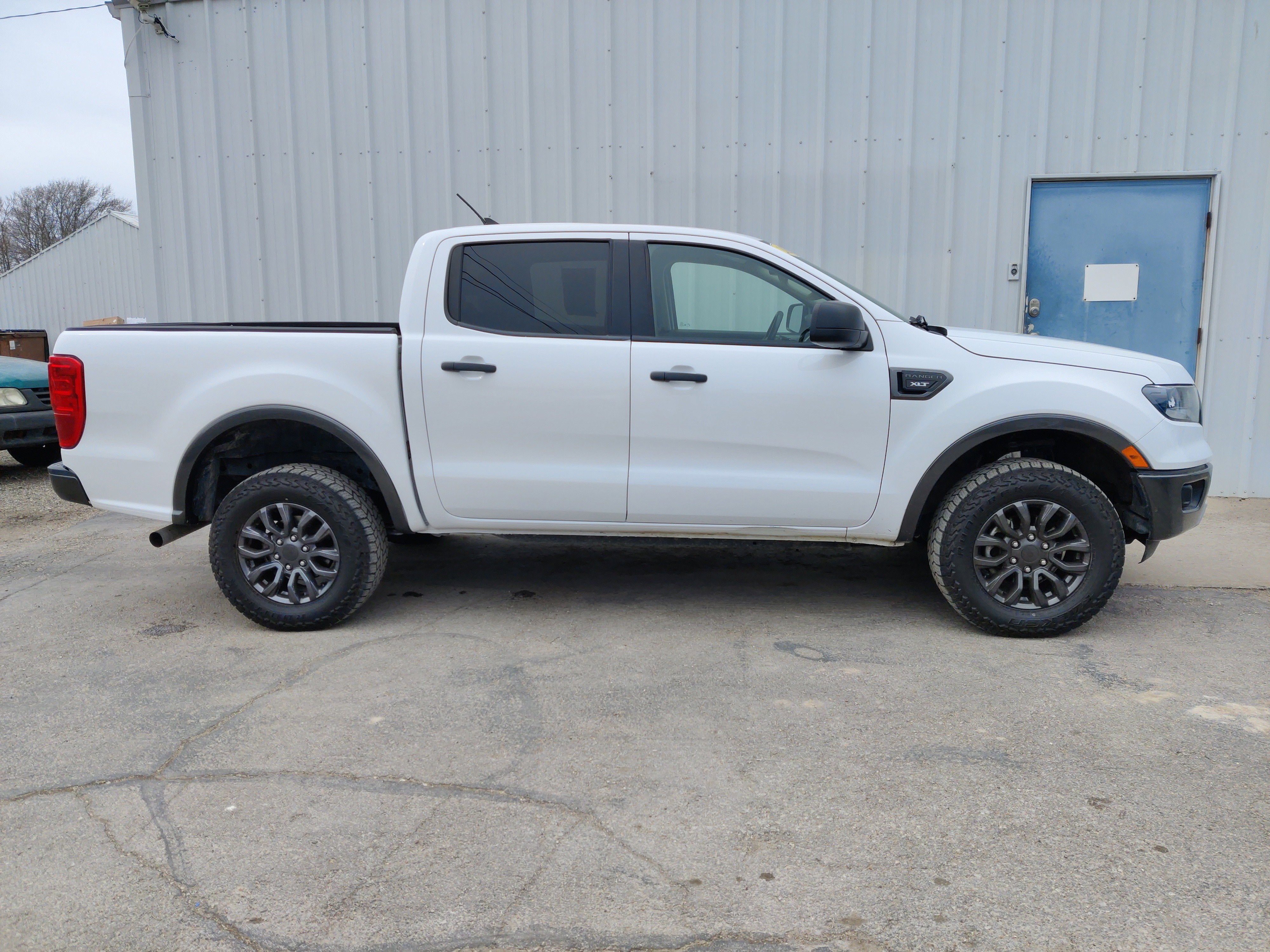 2020 Ford Ranger XLT in Oxford White — front three-quarter view