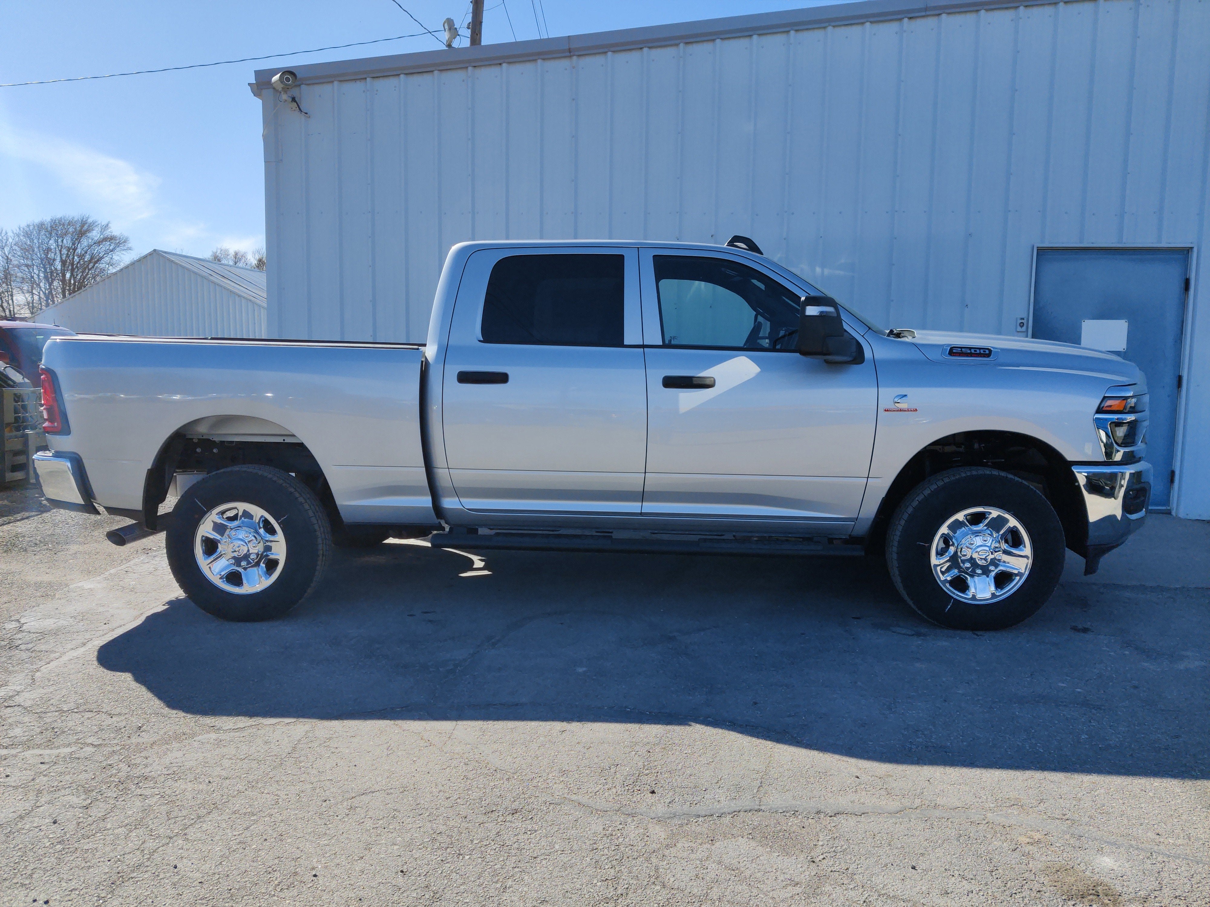 2026 RAM Ram 2500 RAM 2500 TRADESMAN CREW CAB 4X4 6'4' BOX in Silver-Zynith Exterior Paint — front three-quarter view
