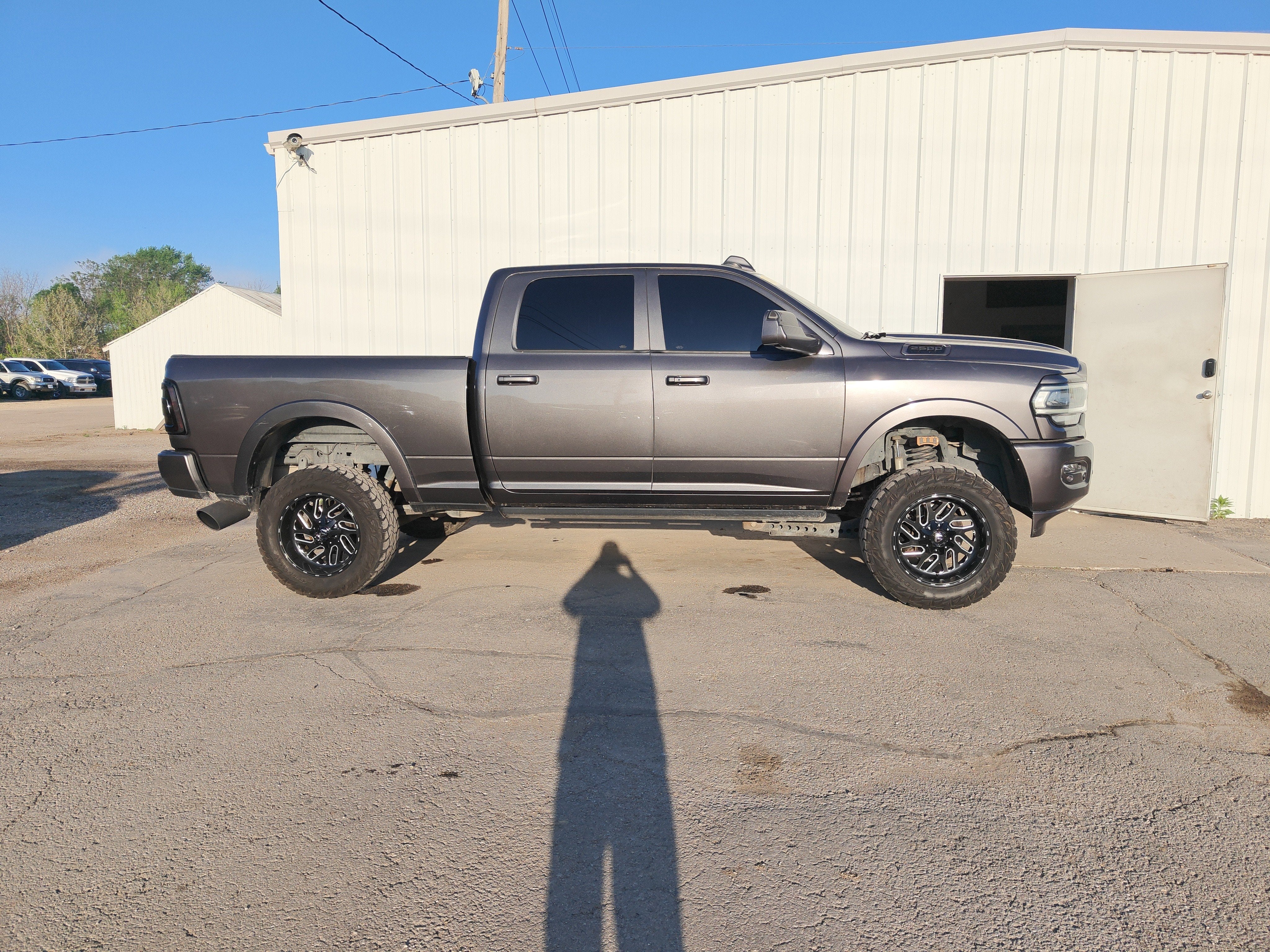 2021 RAM 2500 Laramie Crew Cab 4x4 6'4' Box in Granite Crystal Metallic Clearcoat — front three-quarter view