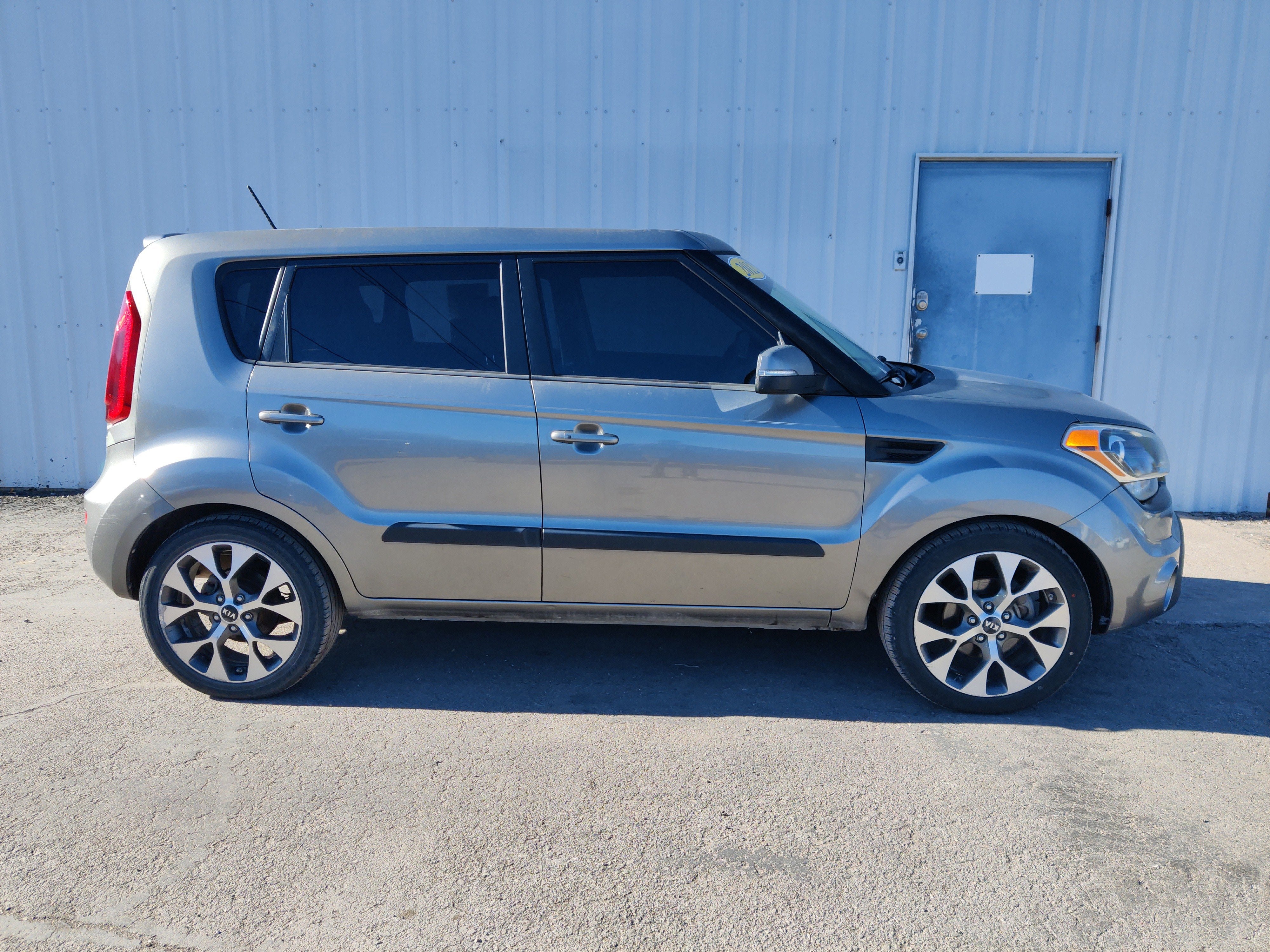 2012 Kia Soul ! in Titanium Pearl Metallic — front three-quarter view